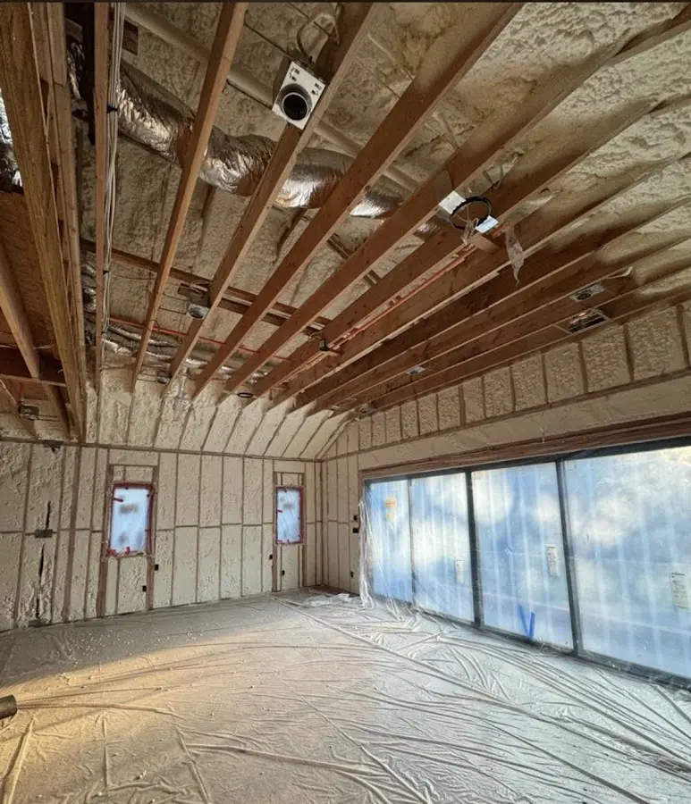 Interior walls and ceiling insulated with spray foam during new construction in Ligonier